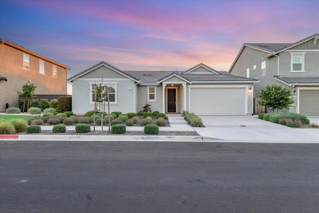 view of front of home featuring a garage