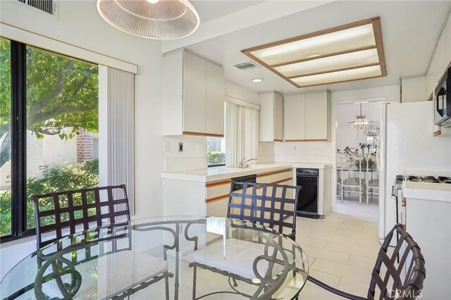 kitchen with sink and white cabinetry