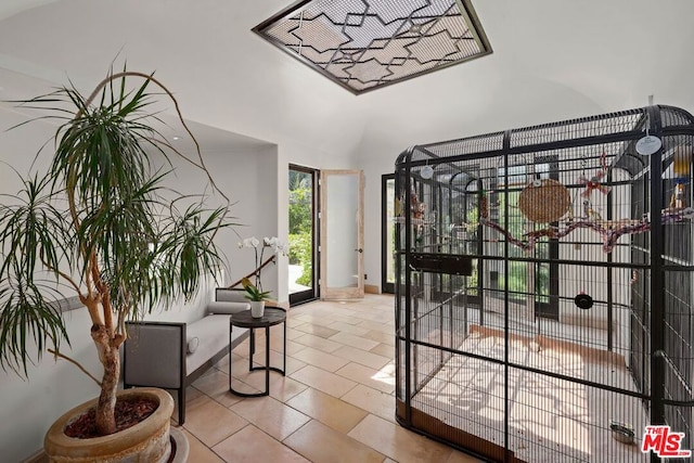 interior space with light tile patterned floors