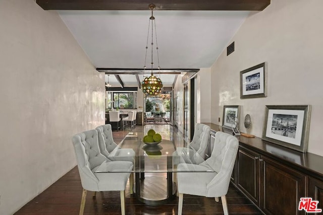 dining space featuring vaulted ceiling with beams and dark wood-type flooring