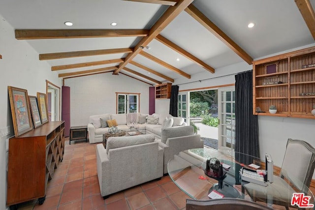 living room with tile patterned floors and lofted ceiling with beams