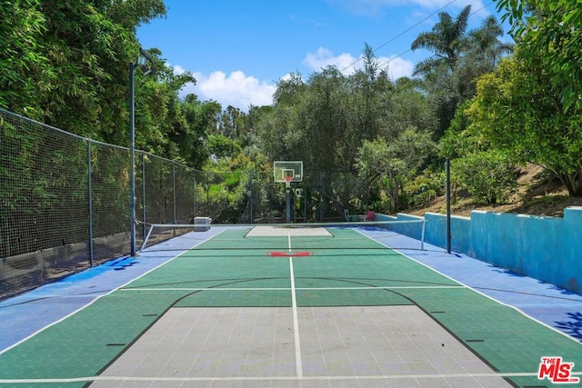 view of sport court with tennis court