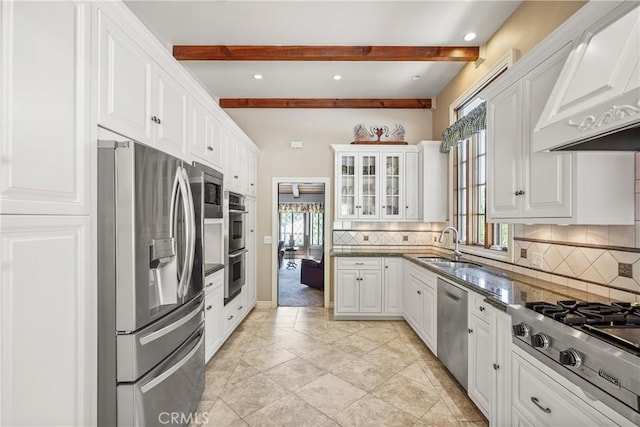 kitchen with beamed ceiling, stainless steel appliances, white cabinetry, and custom exhaust hood