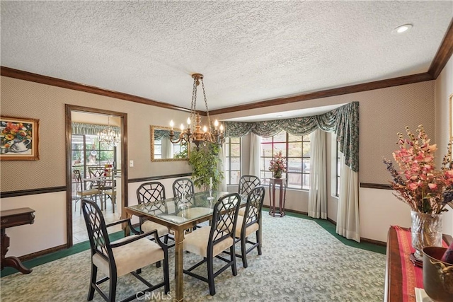 carpeted dining room with a textured ceiling, plenty of natural light, and crown molding