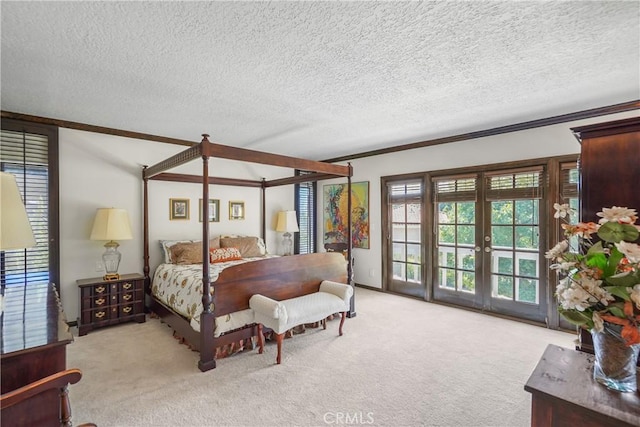 bedroom with ornamental molding, a textured ceiling, light carpet, and french doors