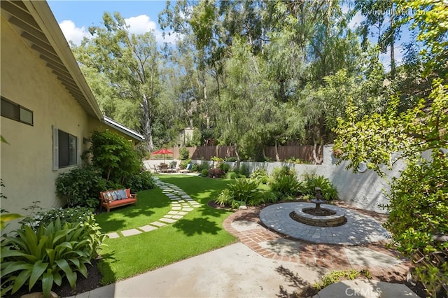 view of yard with a patio area and fence