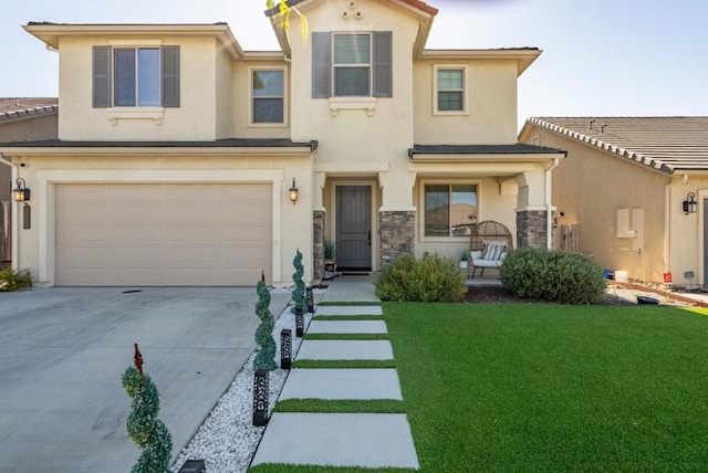 view of front facade featuring a front lawn and a garage