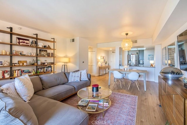 850 E Ocean Blvd Unit 613, Long Beach, CA 90802 - living room featuring light wood-style floors
