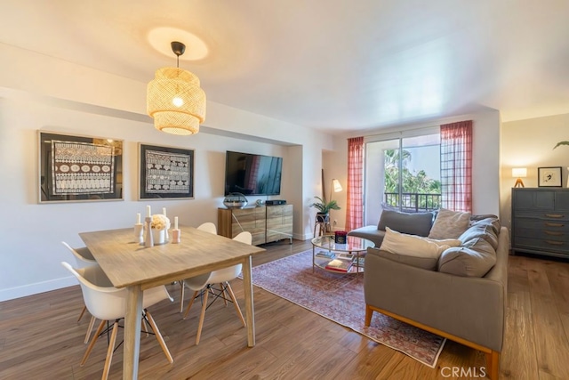 dining area featuring hardwood / wood-style flooring