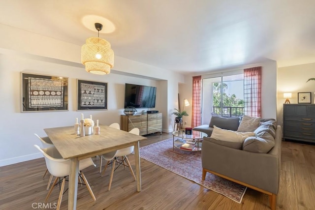 850 E Ocean Blvd Unit 613, Long Beach, CA 90802 - dining area featuring wood finished floors and baseboards
