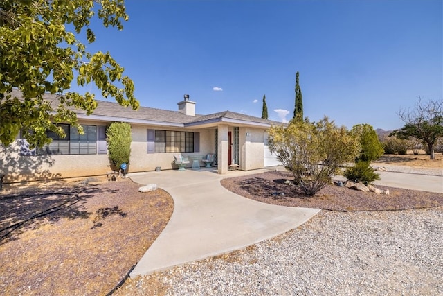 single story home with a garage