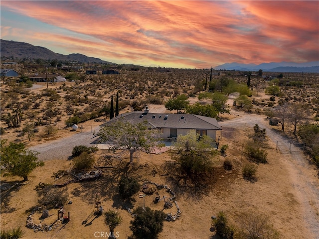 aerial view at dusk with a mountain view