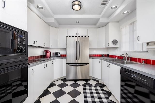 kitchen with sink, white cabinetry, and black appliances