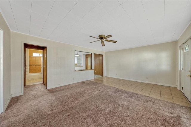 carpeted empty room with ceiling fan