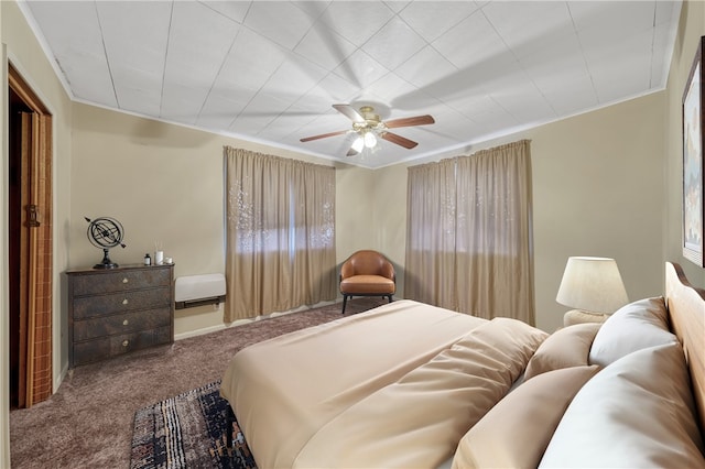 bedroom featuring carpet flooring, ceiling fan, and ornamental molding