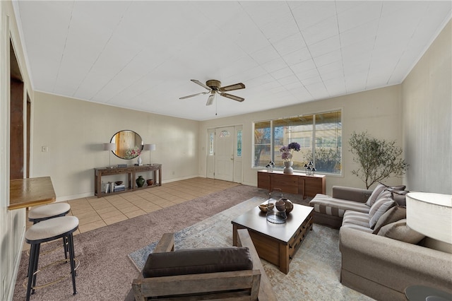 tiled living room featuring ceiling fan