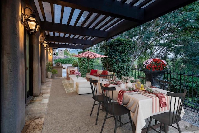 view of patio with outdoor lounge area and a pergola