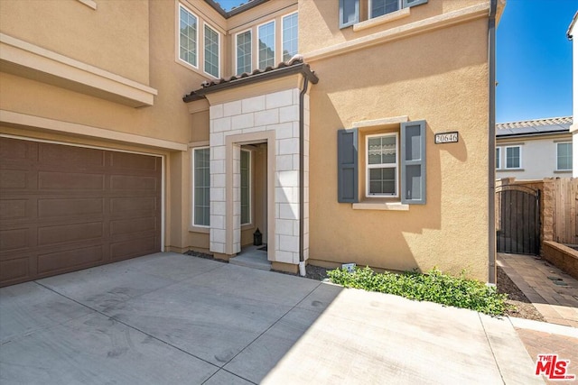 entrance to property with a garage