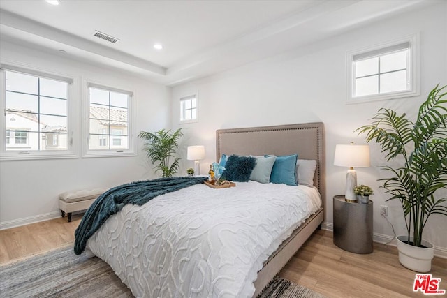 bedroom featuring light hardwood / wood-style floors