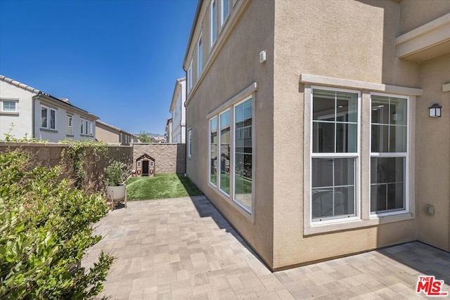 view of home's exterior featuring a patio area