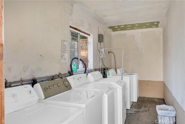 laundry room featuring washing machine and clothes dryer