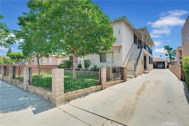 view of front of property featuring a garage