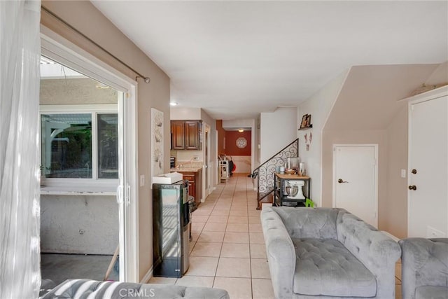 living room with light tile patterned flooring