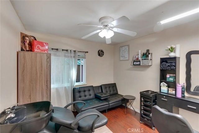 office area with dark hardwood / wood-style floors and ceiling fan