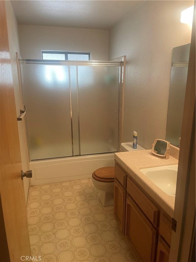 6009 Elwood Rd, Sanger, CA 93657 - full bathroom with vanity, combined bath / shower with glass door, and tile patterned floors