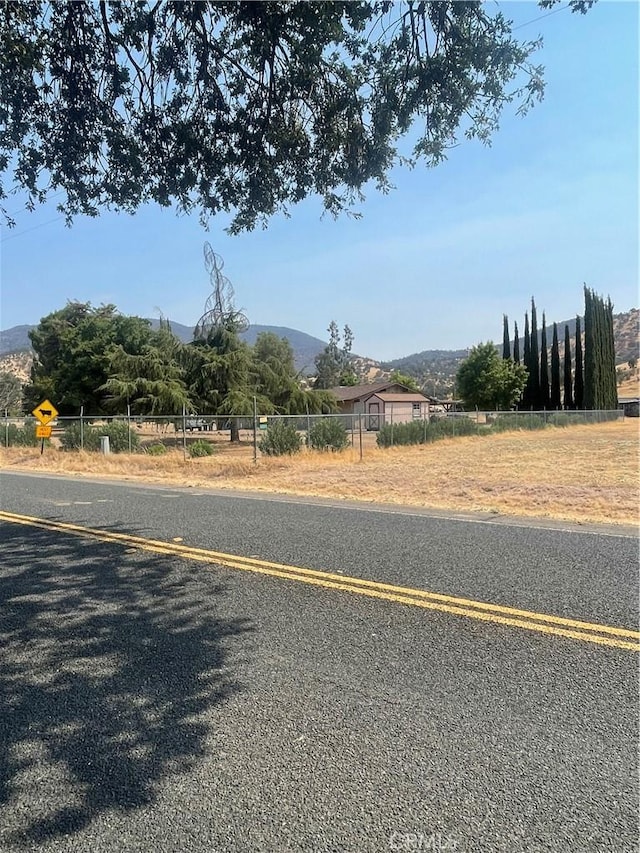 6009 Elwood Rd, Sanger, CA 93657 - view of asphalt road with a mountain view