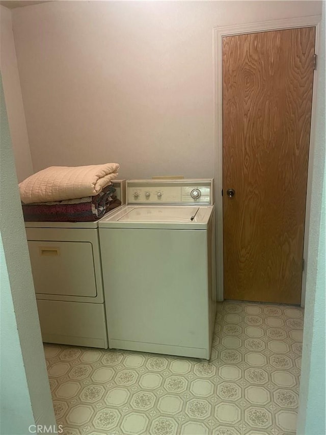 6009 Elwood Rd, Sanger, CA 93657 - washroom featuring washing machine and dryer and light floors