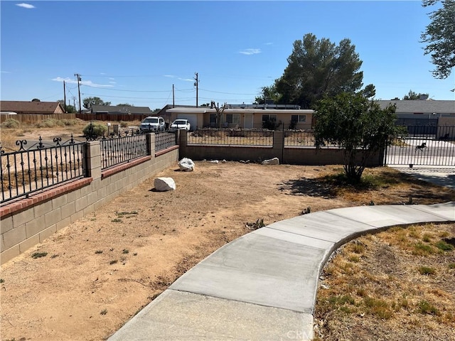view of yard with a fenced front yard