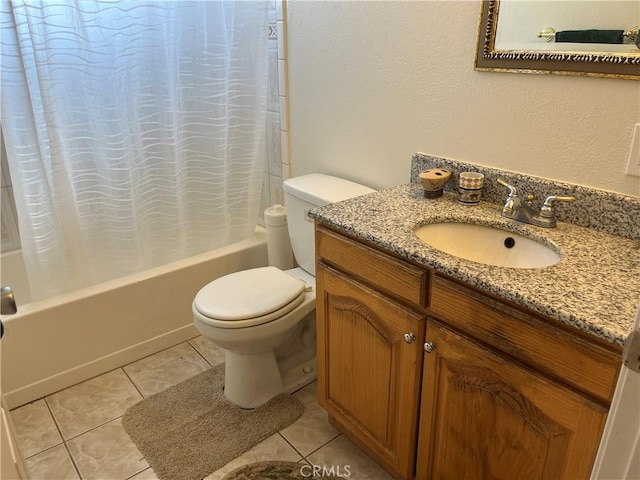 bathroom with tile patterned flooring, shower / tub combo with curtain, and toilet