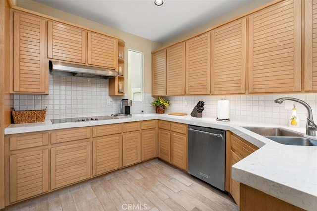 kitchen featuring stainless steel dishwasher, decorative backsplash, sink, and light hardwood / wood-style flooring