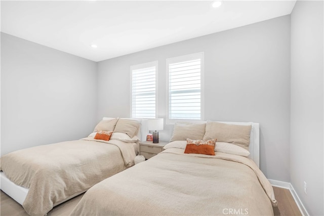 bedroom with light wood-type flooring