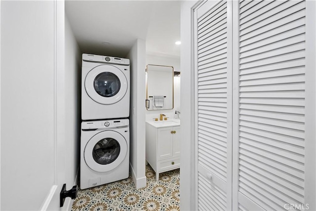 310 Whittley Ave Unit A, Avalon, CA 90704 - laundry area with stacked washer and clothes dryer, a sink, laundry area, and light floors
