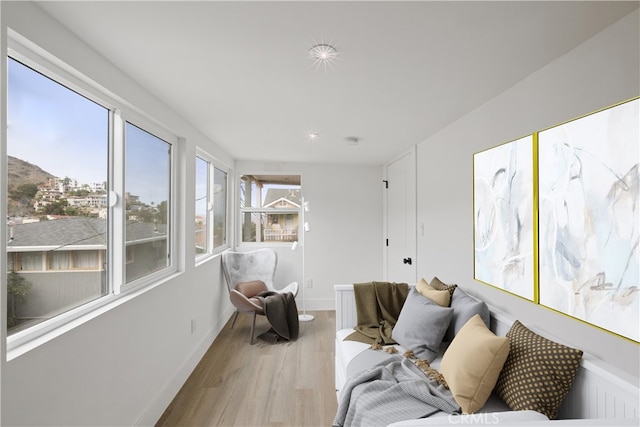 310 Whittley Ave Unit A, Avalon, CA 90704 - living room featuring baseboards and wood finished floors