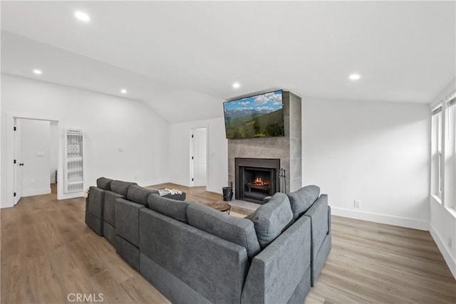 310 Whittley Ave Unit A, Avalon, CA 90704 - living area featuring light wood finished floors, lofted ceiling, and recessed lighting