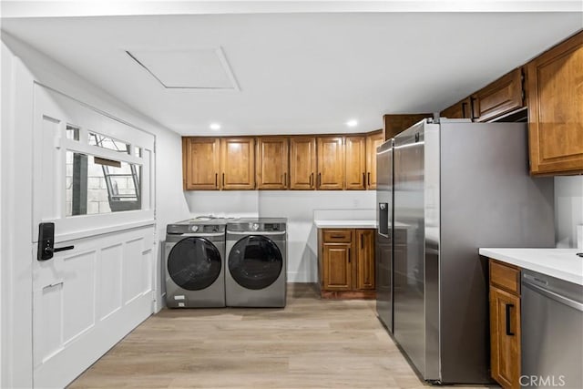 310 Whittley Ave Unit A, Avalon, CA 90704 - washroom featuring attic access, recessed lighting, light wood-style flooring, washer and dryer, and laundry area