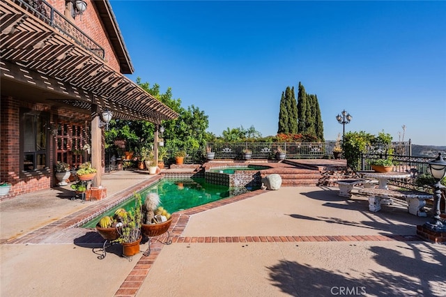 view of pool with a patio