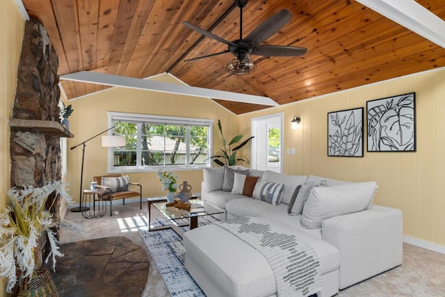 carpeted living room featuring ceiling fan, lofted ceiling with beams, and wooden ceiling