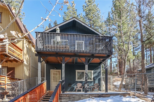 view of front of home with a wooden deck