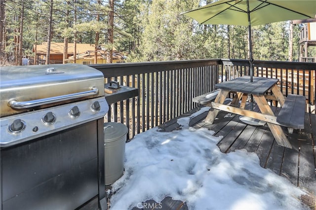 deck featuring a grill