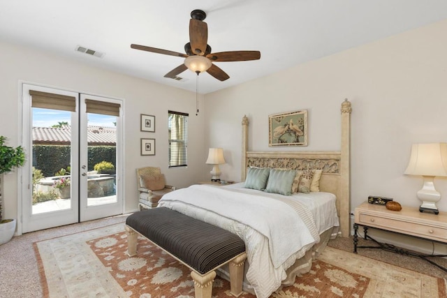 bedroom featuring access to exterior, light colored carpet, and ceiling fan