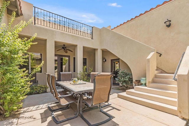 view of patio featuring ceiling fan