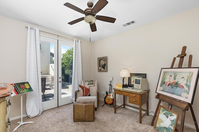 carpeted office featuring ceiling fan and french doors