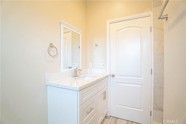 9246 Cedros Ave Unit 1, Panorama City, CA 91402 - bathroom featuring vanity and a marble finish shower
