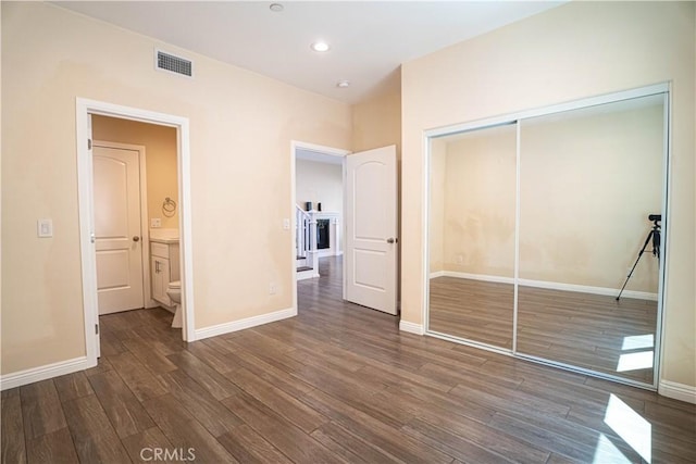9246 Cedros Ave Unit 1, Panorama City, CA 91402 - unfurnished bedroom with a closet, wood finished floors, and recessed lighting