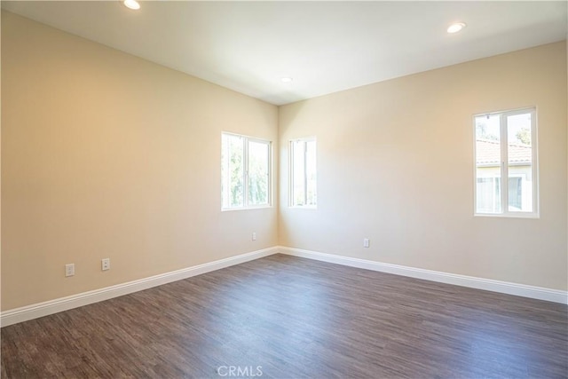 9246 Cedros Ave Unit 1, Panorama City, CA 91402 - spare room with dark wood-type flooring and recessed lighting