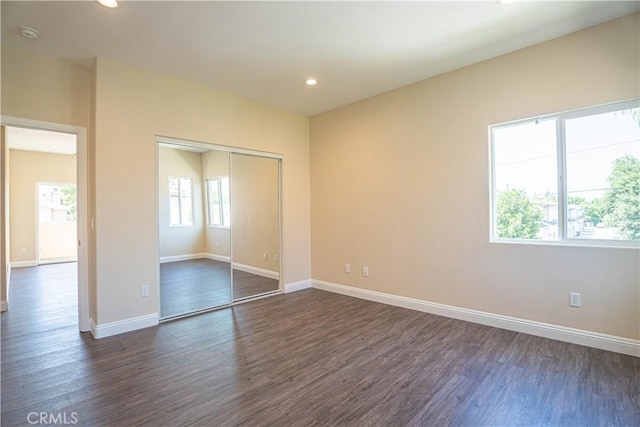 9246 Cedros Ave Unit 1, Panorama City, CA 91402 - unfurnished bedroom featuring dark wood-type flooring, a closet, and recessed lighting